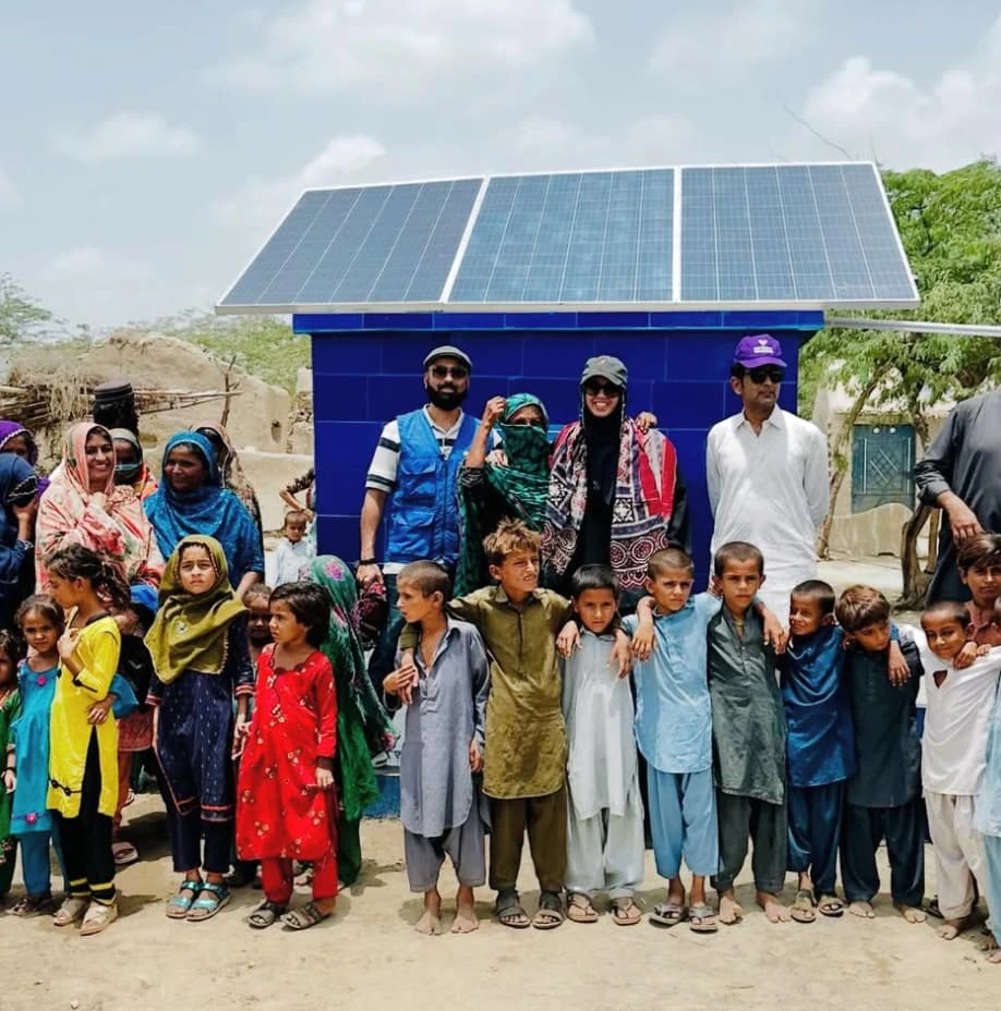 Volunteers with community