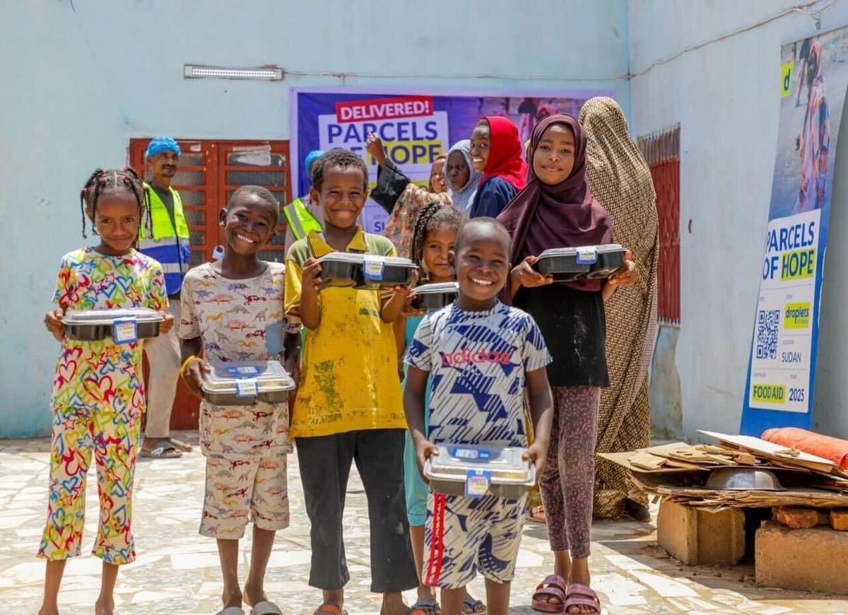 Children receiving food parcels in Sudan — Droplets of Mercy