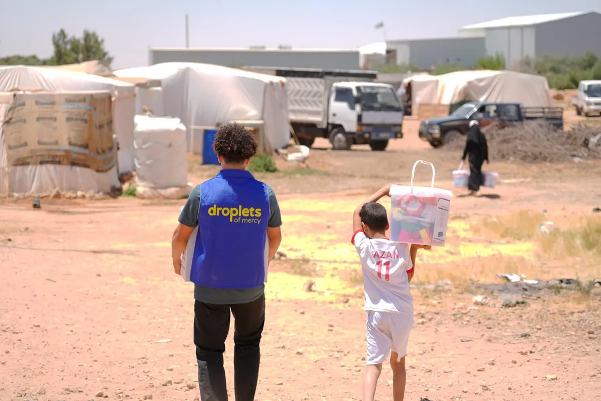 Aid delivery at a displacement camp